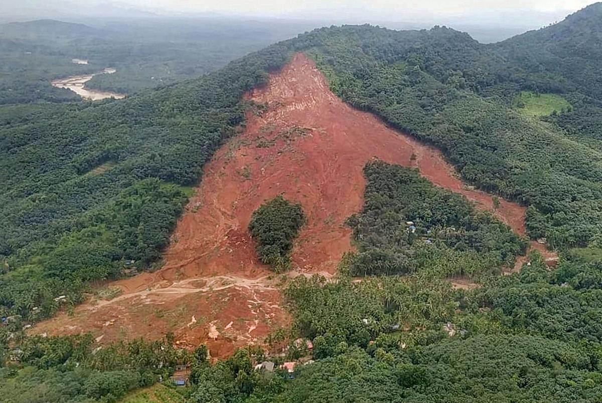 An aerial view of the site of landslide which affected several houses at Muthappankunnu, in Kavalappara of Malappuram district. PTI photo