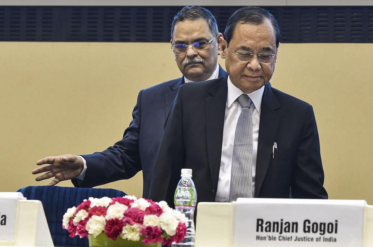 Chief Justice of India Justice Ranjan Gogoi with Central Bureau of Investigation (CBI) Director Rishi Kumar Shukla during the 18th Late Dharamnath Prasad Kohli memorial lecture organised by CBI, in New Delhi. (PTI Photo)