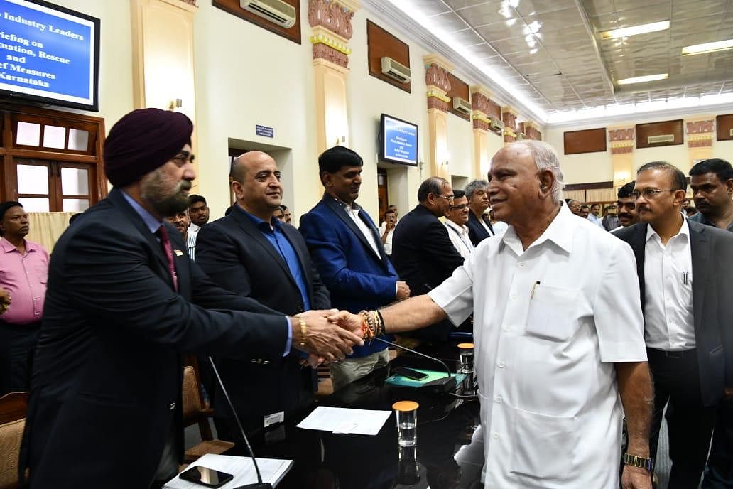 Karnataka Chief Minister BS Yediyurappa greets industry leaders at Vidhana Soudha. DH photo