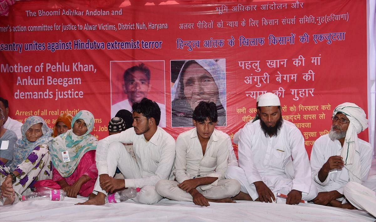  A file photo is seen Alwar lynching victim Pehlu Khan's mother Ankuri Beegam (L) and other family members at a dharna, at Jantar Mantar in New Delhi. (PTI)