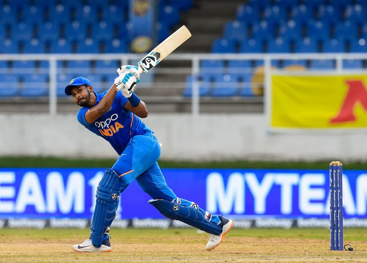 Shreyas Iyer of India hits 6 during the 3rd ODI match between West Indies and India at Queens Park Oval, Port of Spain, Trinidad and Tobago. (AFP Photo)