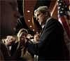 Sen John Kerry D-Mass., right, speaks with reporters on Capitol Hill in Washington, Thursday, Dec. 10, 2009, following a news conference to discuss comprehensive climate change and energy independence legislation. AP