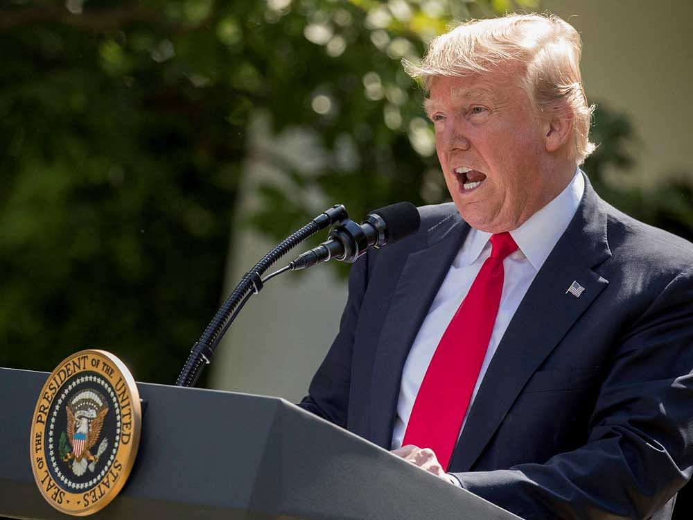Donald Trump had announced the USA's exit from the Paris Accords, saying that India was using the accords to siphon of billions of dollars as aid. AP/PTI file photo.