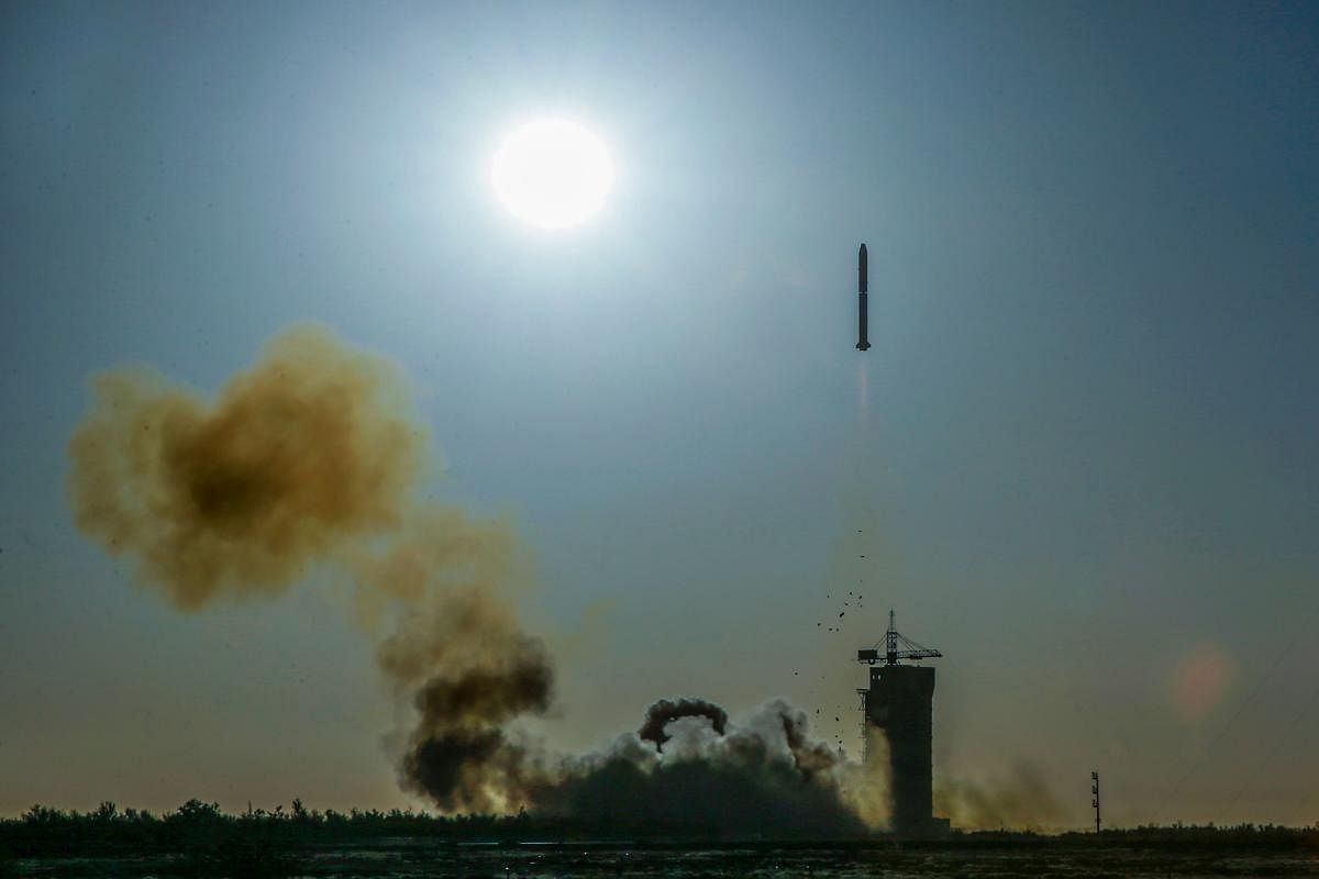 A Long March-2C rocket lifts off from the Jiuquan Satellite Launch Centre in Jiuquan in northwest China's Gansu province on October 29, 2018. (Photo by STR / AFP) / China OUT