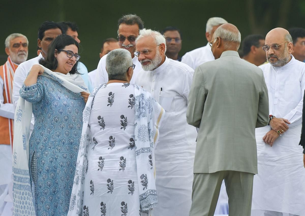 President Ram Nath Kovind with Prime Minister Narendra Modi, Home Minister Amit Shah interacts with BJP veteran late Atal Bihari Vajpayee's daughter Namita Kaul during prayer meeting to pay tributes to former prime minister Atal Bihari Vajpayee at his memorial, Sadaiv Atal, on his first death anniversary, in New Delhi, Friday, Aug 16, 2019. (PTI Photo)