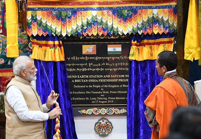 PM Narendra Modi and Bhutan counterpart Lotay Tshering jointly inaugurating the Ground Earth Station & SATCOM network, for utilization of South Asia Satellite in Bhutan. (Twitter/PIB_India)