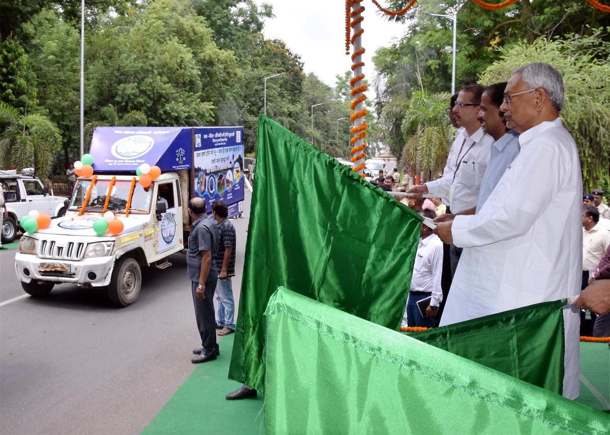 Bihar Chief Minister Nitish Kumar flags off Water-Life-Greenery awareness campaign van in Patna, Saturday, Aug 17, 2019. (PTI Photo) 