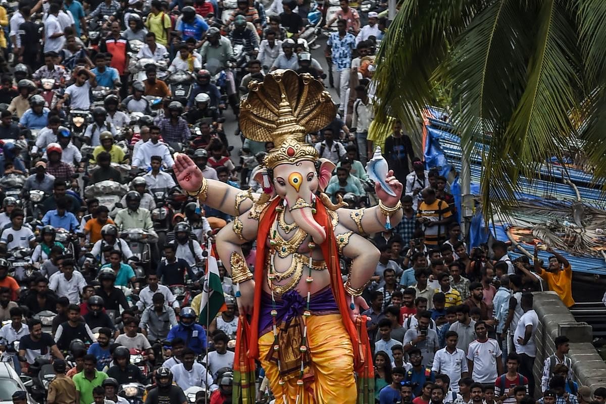 The 'Mumbai cha Raja' of Lalbaug, which is into the 90th year of celebrations, has decided to create Ram mandir and Ganesh mandals to raise Rs 10cr for flood relief. (AFP file photo)