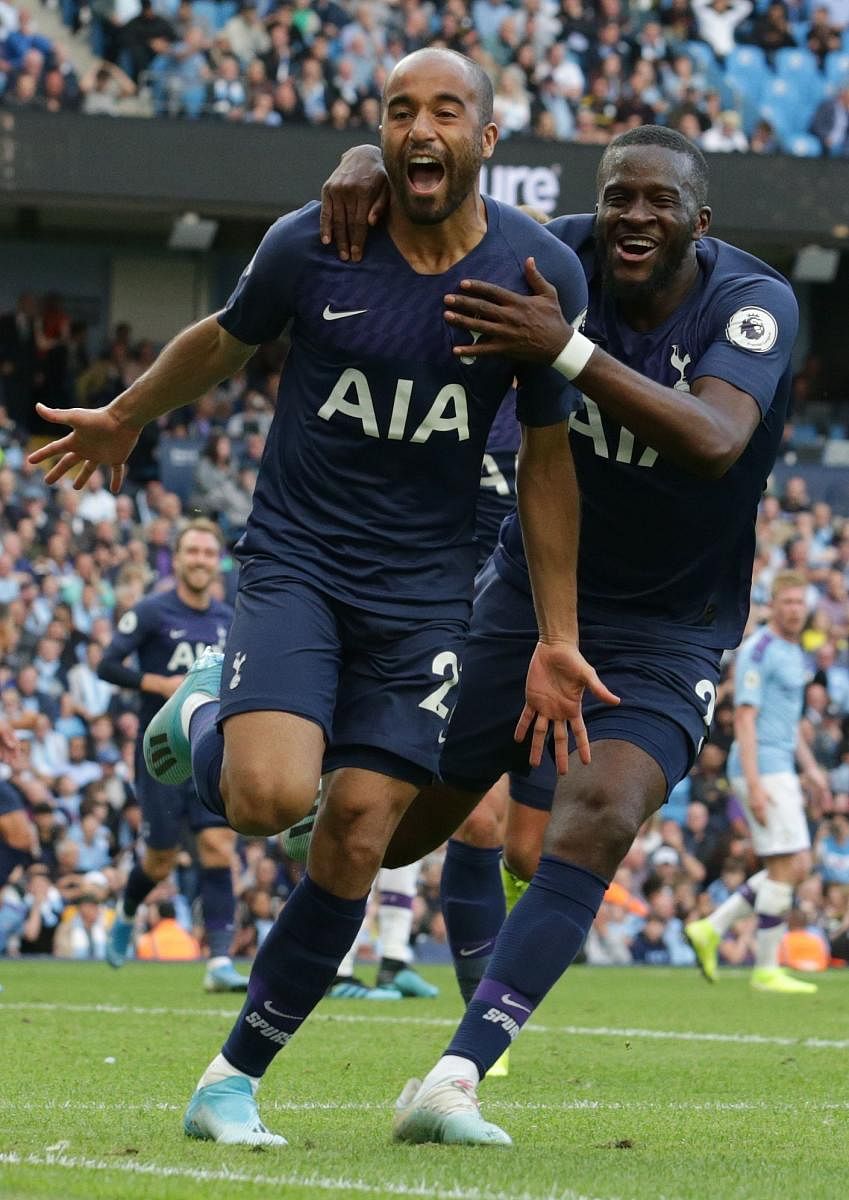 Tottenham Hotspur's Lucas Moura (left) celebrates after scoring his team's equaliser against Manchester City in their Premier League game on Saturday. AFP