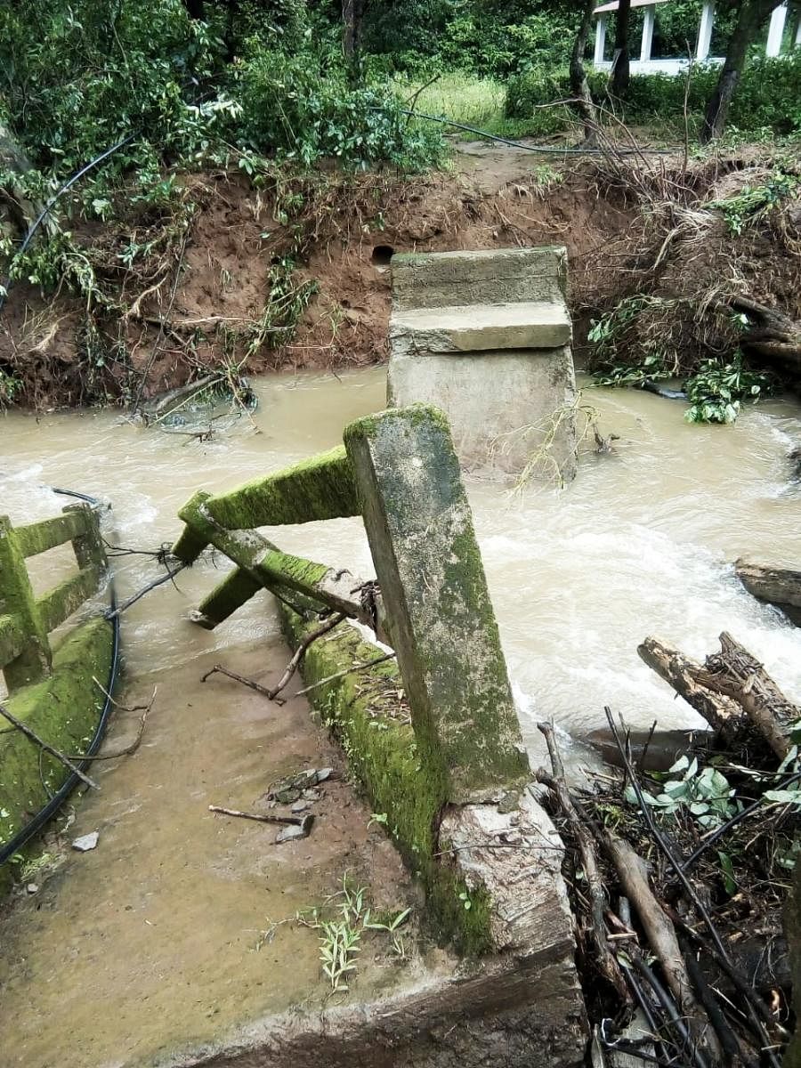 The bridge, connecting Hattihole and Mukkodlu villages, is damaged due to flood.