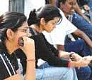 IIM aspirants at an examination centre in Bangalore on Monday. DH photo