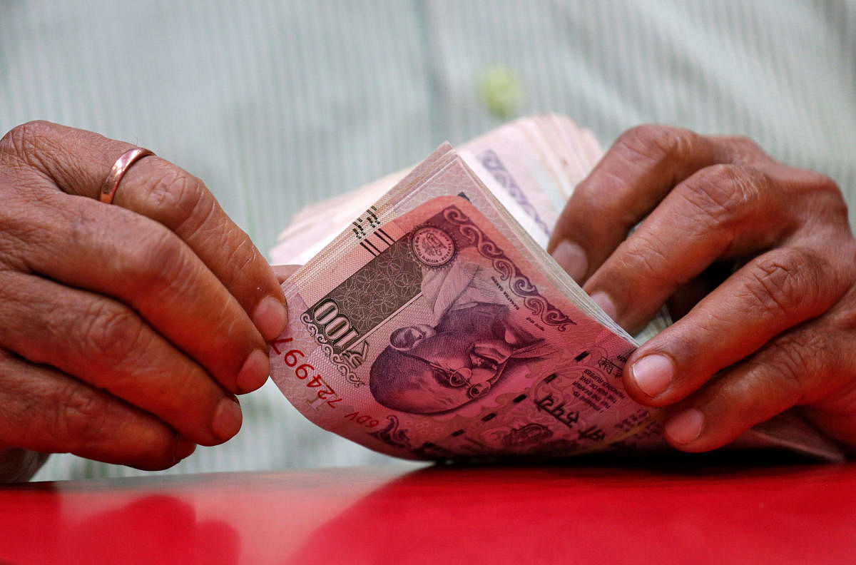 On Monday, the rupee had tumbled 29 paise to close at an over six-month low of 71.43 against the US dollar amid growing worries over the economic slump. (Reuters photo)