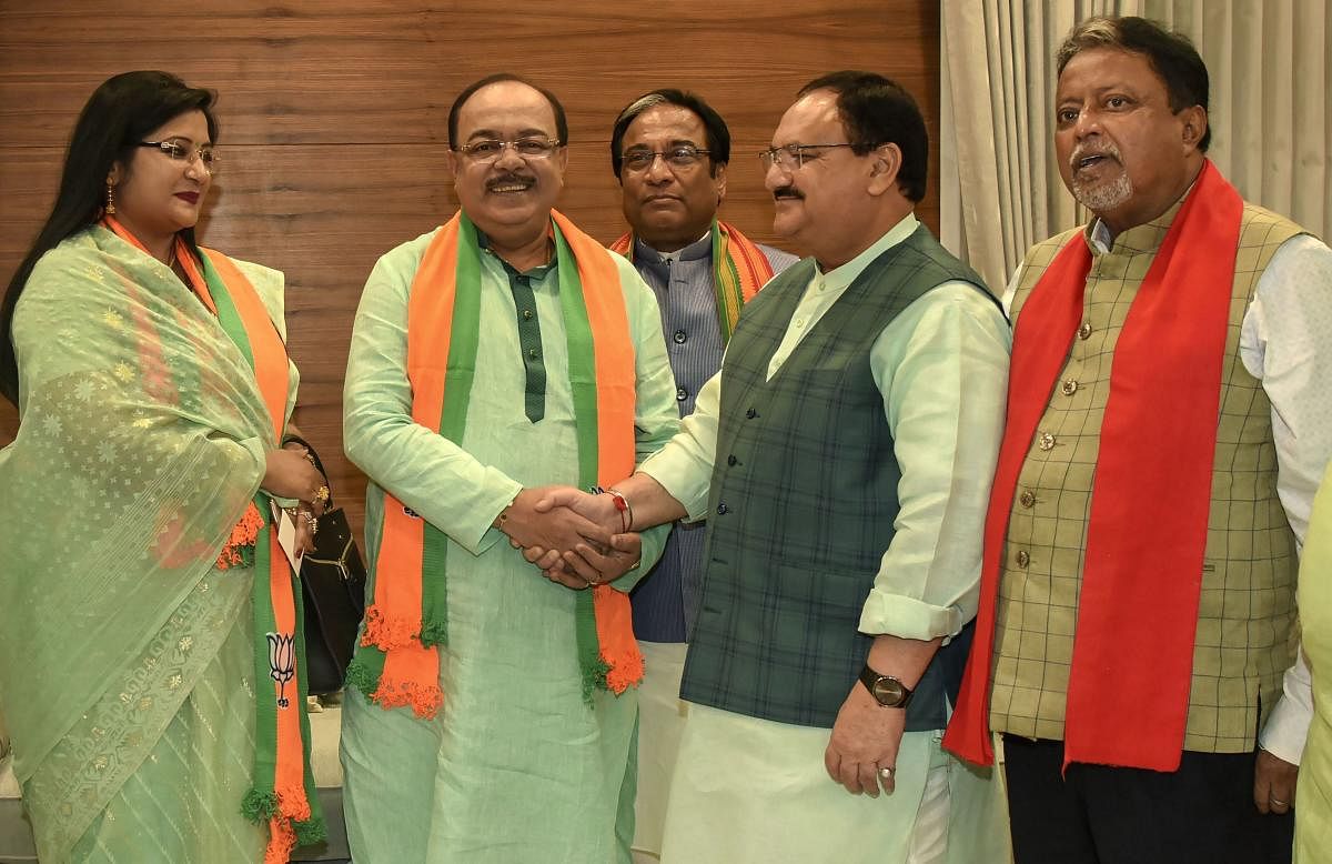 New Delhi: Former Kolkata Municipal Corporation mayor Sovan Chatterjee and his Professor Baisakhi Banerjee join Bharatiya Janata Party in the presence of party's working president J P Nadda. (PTI Photo)
