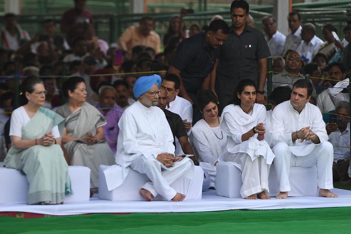 Congress president Sonia Gandhi (L), Rahul Gandhi (R) and India's former Prime Minister Manmohan Singh (C) attend a memorial ceremony to mark the 75th birth anniversary of Rajiv Gandhi. (AFP file photo)