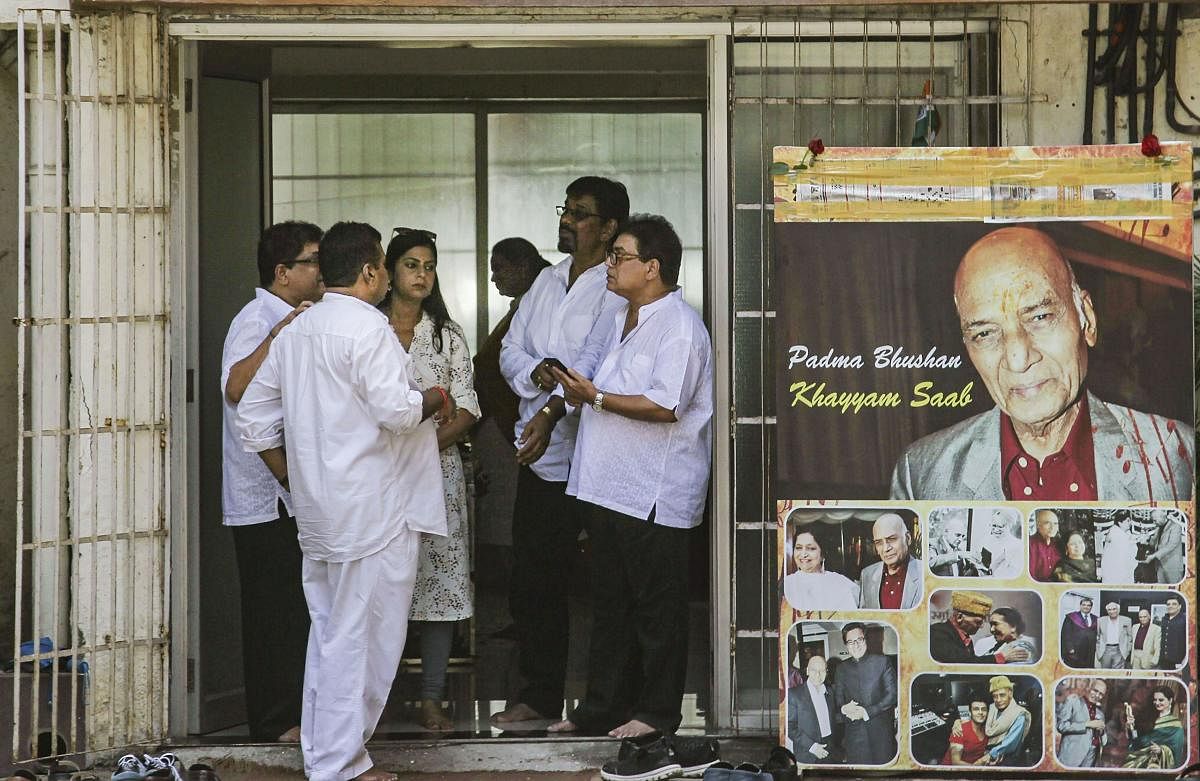People arrive to pay their last respects to legendary music composer Mohammed Zahur Khayyam Hashmi, at his residence in Mumbai, on Aug 20, 2019. Khayyam, 92, passed away at a Mumbai hospital on Monday after a prolonged illness. PTI