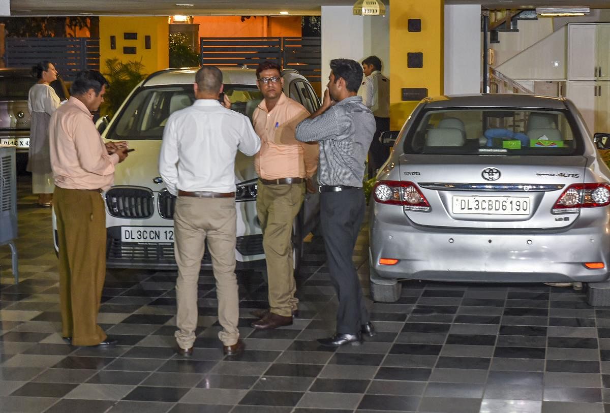 Enforcement Directorate (ED) officials inside the residence of Congress leader P. Chidambaram during a raid, in Jorbagh, New Delhi. (PTI Photo)
