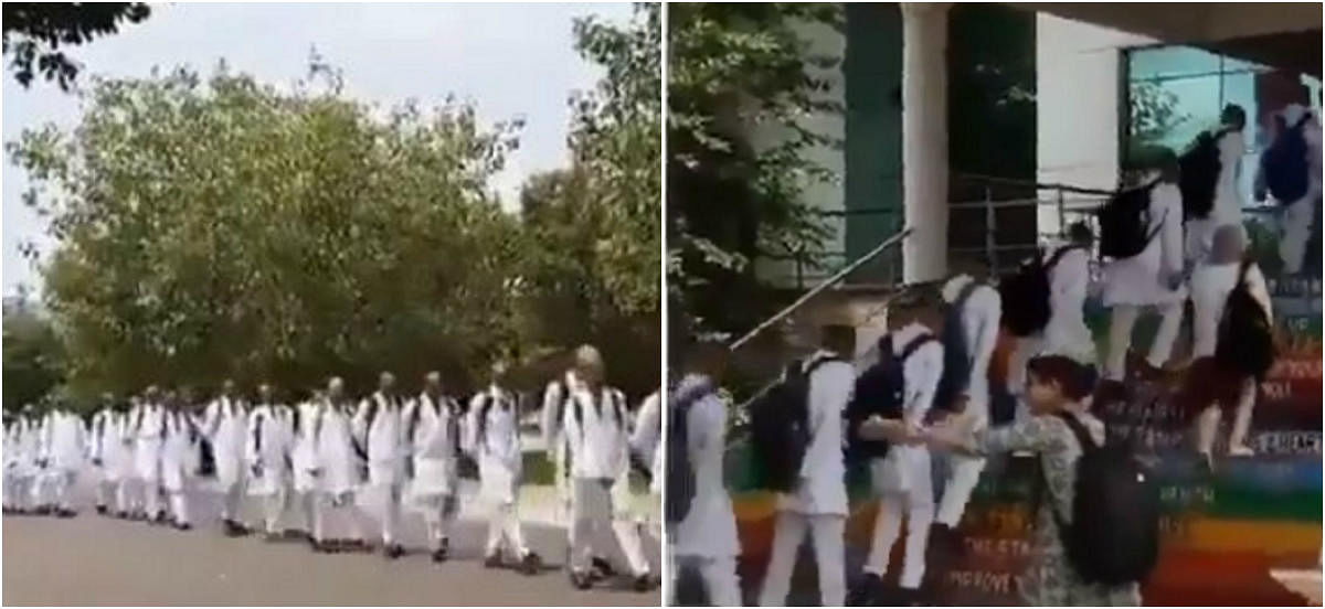 The first year medical students were forced to tonsure their heads and march on the road by their seniors. (Photo: Twitter video screengrab)