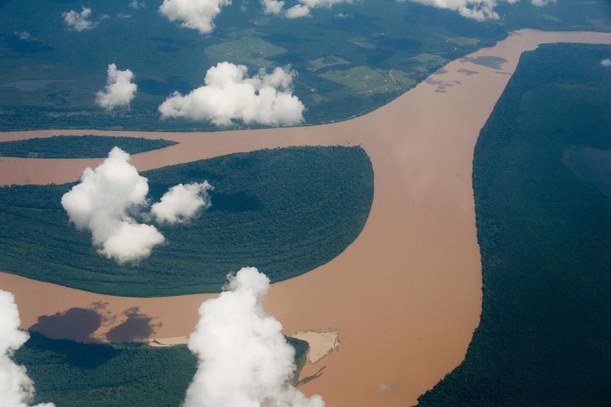 (FILES) This file picture taken on December 12, 2013 shows an aerial view of the Amazon river in the Brazilian state of Amazonas on December 12, 2013. Brazil's Protected Areas of the Amazon (Arpa) programme, the world's largest conservation initiative for