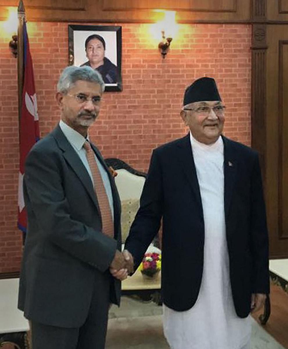 External Affairs Minister S Jaishankar is greeted by Nepal's Prime Minister KP Sharma Oli during a meeting, in Kathmandu (PTI Photo)