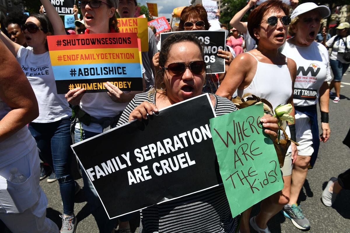 People demonstrate in Washington, DC demanding an end to the separation of migrant children from their parents. (AFP File Photo)