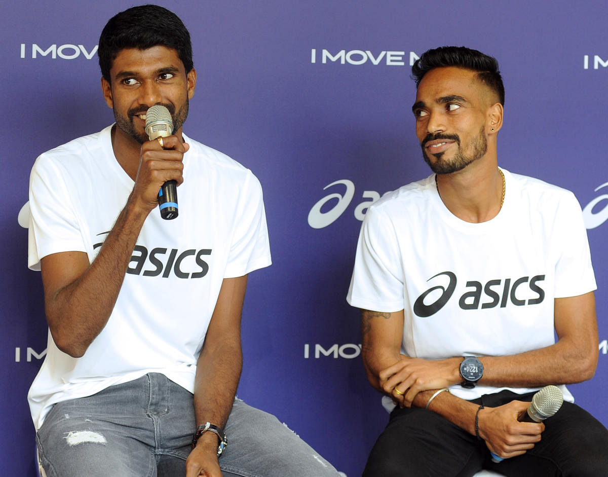 Athletes Jinson Johnson (left) and T Gopi during a media interaction in Bengaluru on Thursday. DH Photo/ Pushkar V