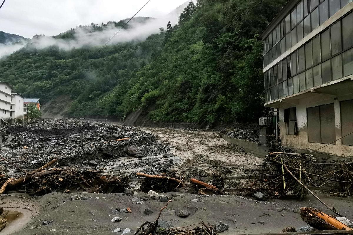 This photo taken on August 21, 2019 shows the aftermath of a mudslide caused by heavy rainfall in Wenchuan county, in China's southwestern Sichuan province. AFP Photo