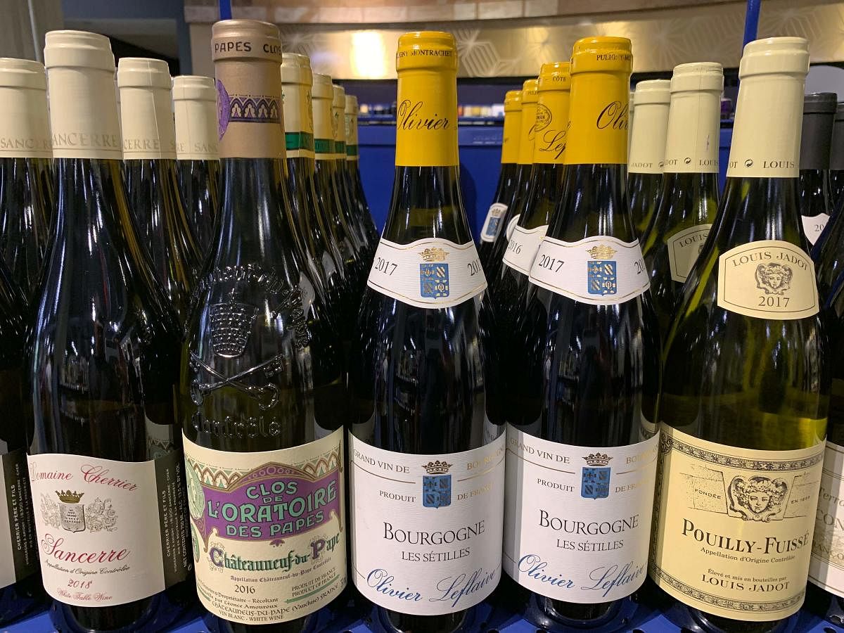 French wines are dislpayed for sale at a supermarket in Los Angeles, California on August 18, 2019. - President Donald Trump has floated the idea of a tariff of as much as 100% on French wine while speaking at a recent fundraiser, in response to the French tax on US tech firms. AFP