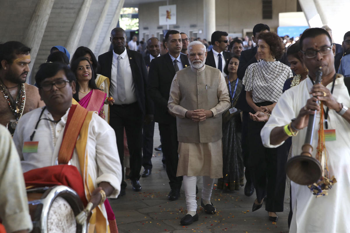 Indian Prime Minister Narendra Modi arrives with UNESCO'S Director-General Audrey Azoulay, second right, Friday, Aug. 23, 2019 in Paris at the United Nations Educational, Scientific and Cultural Organization (UNESCO) headquarters. AP/PTI photo