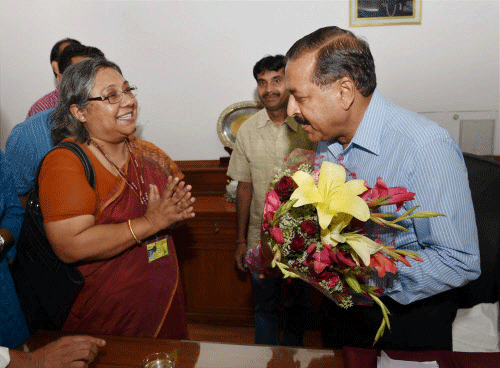 Jitendra Singh is greeted by officials after he assumed charge as Minister of State for Personnel, Public Grievances & Pensions in New Delhi on Tuesday. PTI Photo