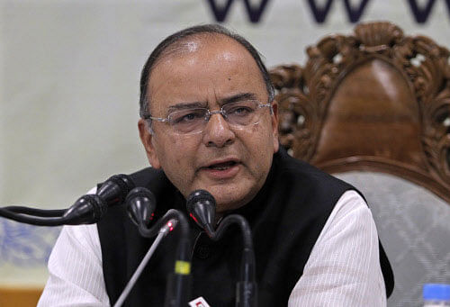 India is committed to easing bottlenecks that have caused inflation to spike, Finance Minister Arun Jaitley said, blaming energy costs and speculative hoarding for a rise in wholesale prices that contributed to an investor selloff on Monday. Reuters photo