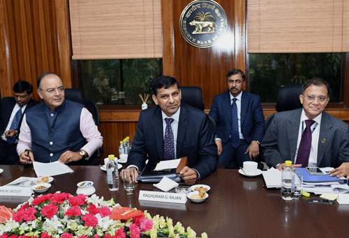 Finance Minister Arun Jaitley with RBI Governor Raghuraman Rajan and Deputy Governor Harun R Khan during the RBI Central Board Meeting in New Delhi on Sunday. PTI Photo