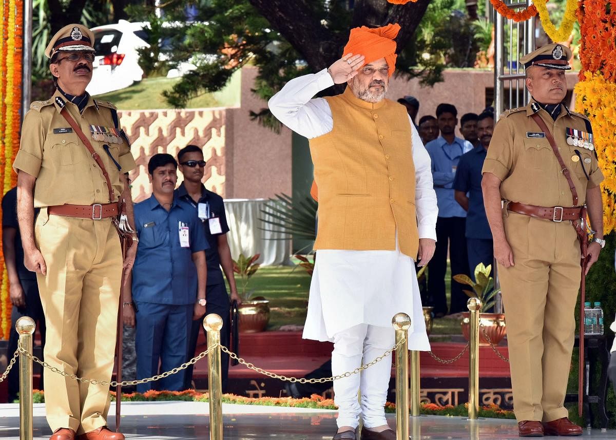 Hyderabad: Home Minister Amit Shah reviews the 'Dikshant Samaroh' (passing out parade) of IPS probationers at National Police Academy in Hyderabad. (PTI Photo)