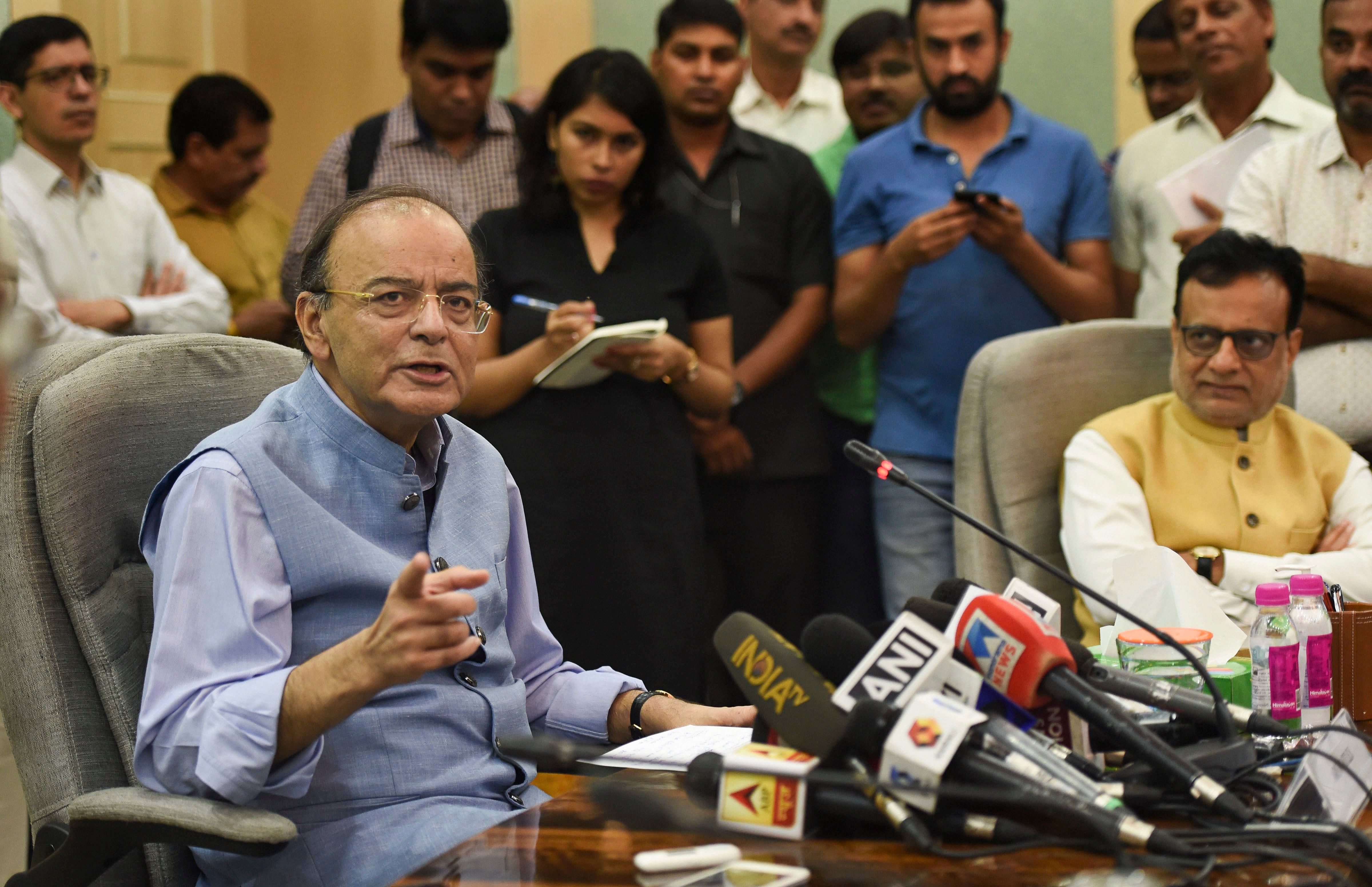 Union Finance Minister Arun Jaitley addresses the media at North Block, in New Delhi, Thursday. Jaitley announced a cut of Rs 1.50 on excise duty for crude oil and an additional Re 1 will be absorbed by OMCs with immediate effect. PTI