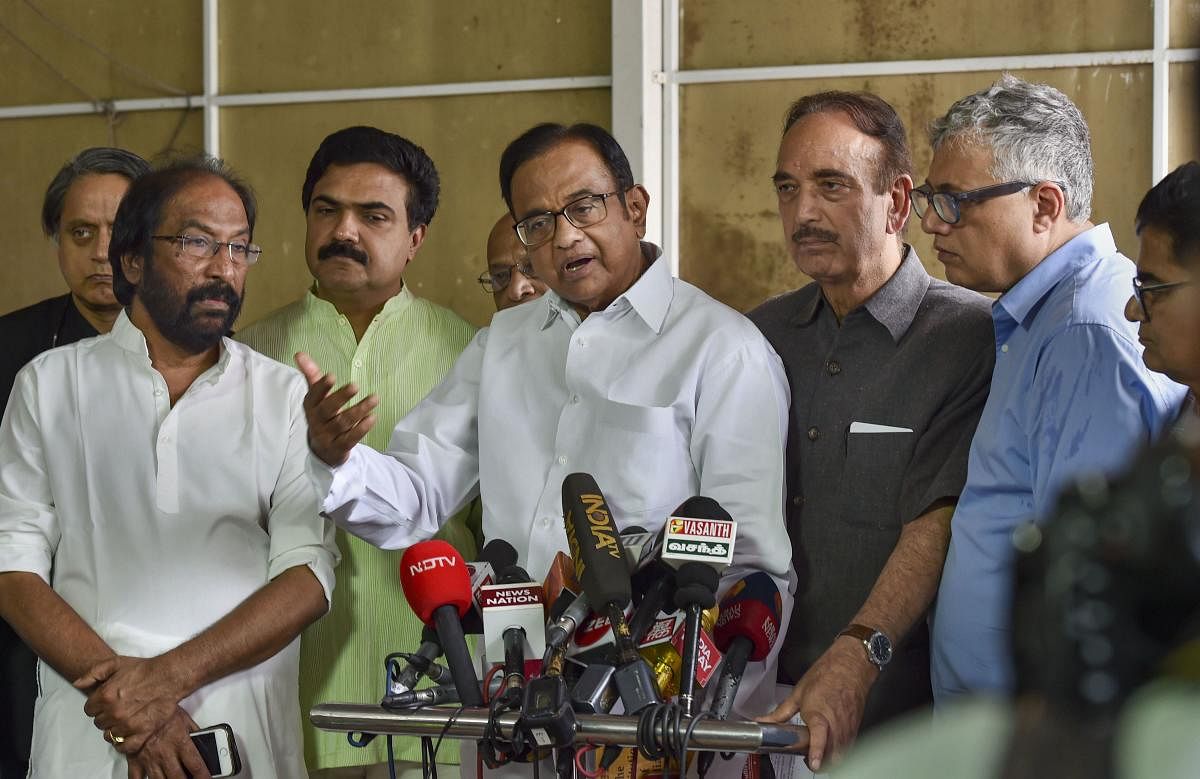 Senior Congress leader P Chidambaram addresses the media after Union Home Minister Amit Shah introduced the proposal to remove Article 370 in the state of Jammu and Kashmir, at the Parliament during the Budget Session, in New Delhi, Monday, Aug 05, 2019. Congress leaders Gulam Nabi Azad, Shashi Tharoor and others are also seen. (PTI Photo)