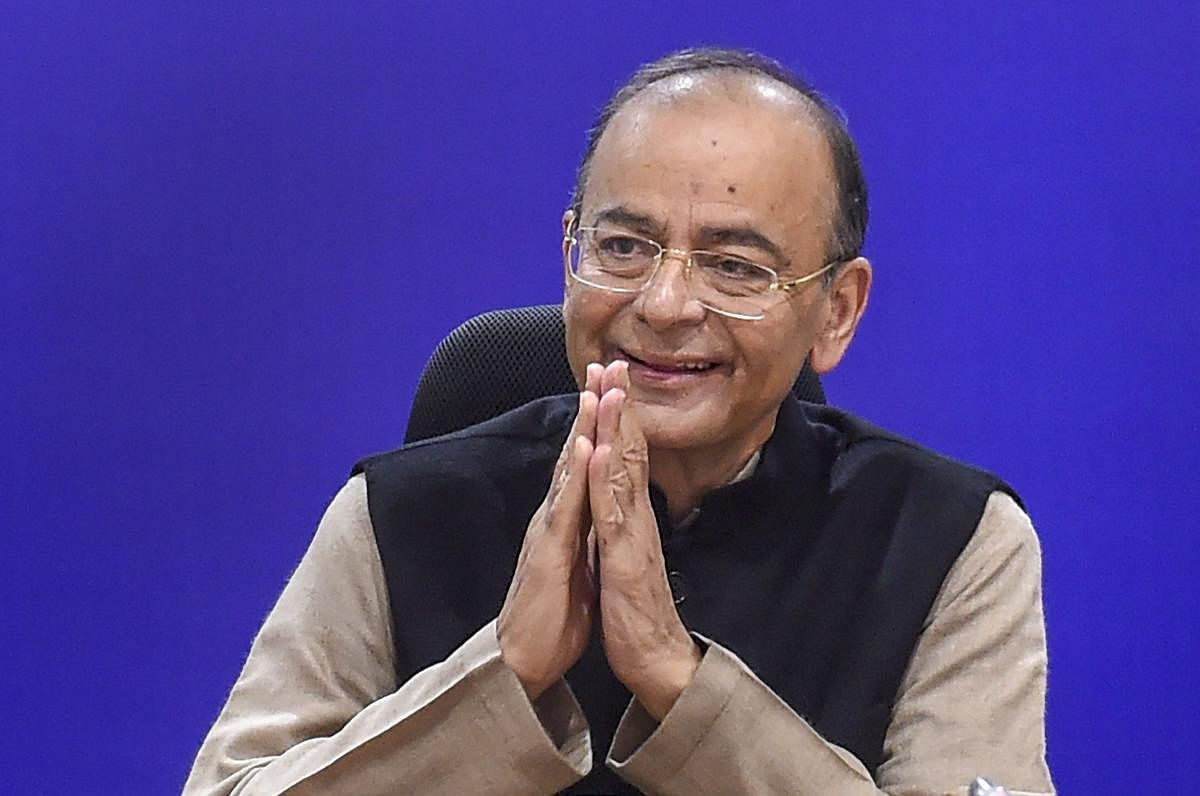 Union Finance Minister Arun Jaitley greets during the 32nd Goods and Services Tax (GST) Council meet, in New Delhi, Thursday, Jan.10, 2019. (PTI Photo)