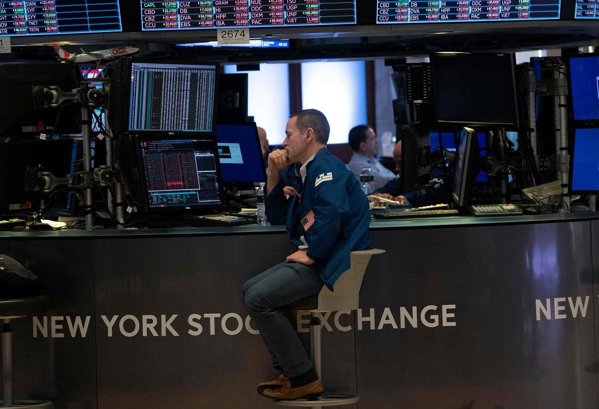 Traders work the floor of the New York Stock Exchange on August 23, 2019 in New York. (AFP Photo)