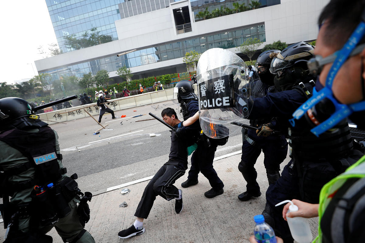 Riot police detain a demonstrator as they clash during a protest in Hong Kong, China. Reuters photo