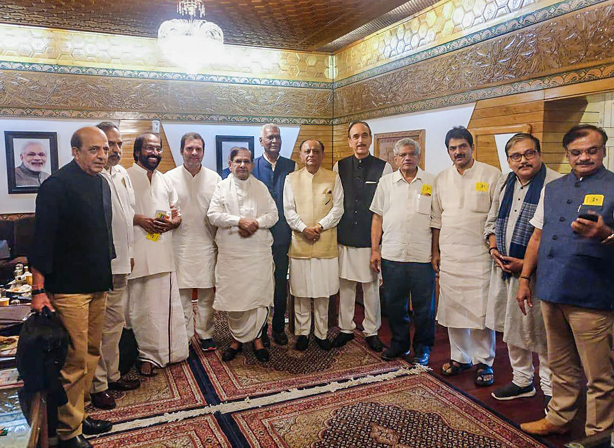 Congress leader Rahul Gandhi and Ghulam Nabi Azad, Left party leaders D Raja and Sitaram Yechury, Loktantrik Janata Dal (LJD) chief Sharad Yadav, DMK MP Tiruchi Siva and others at Srinagar airport, Saturday, Aug 24, 2019. (PTI photo)
