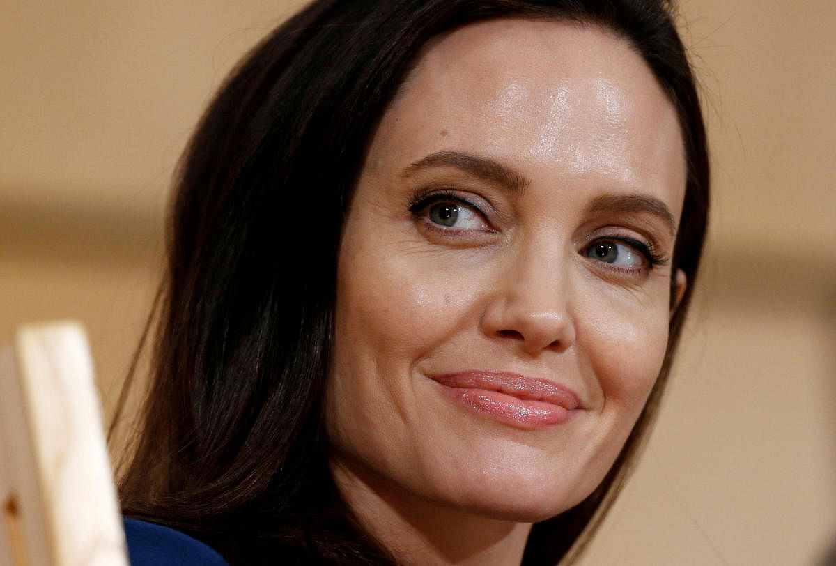 Jolie, one of the biggest stars of Hollywood, also revealed her look from upcoming Marvel movie "The Eternals" in which she will play the role of fierce warrior Thena, at D23 Expo. (Reuters photo)