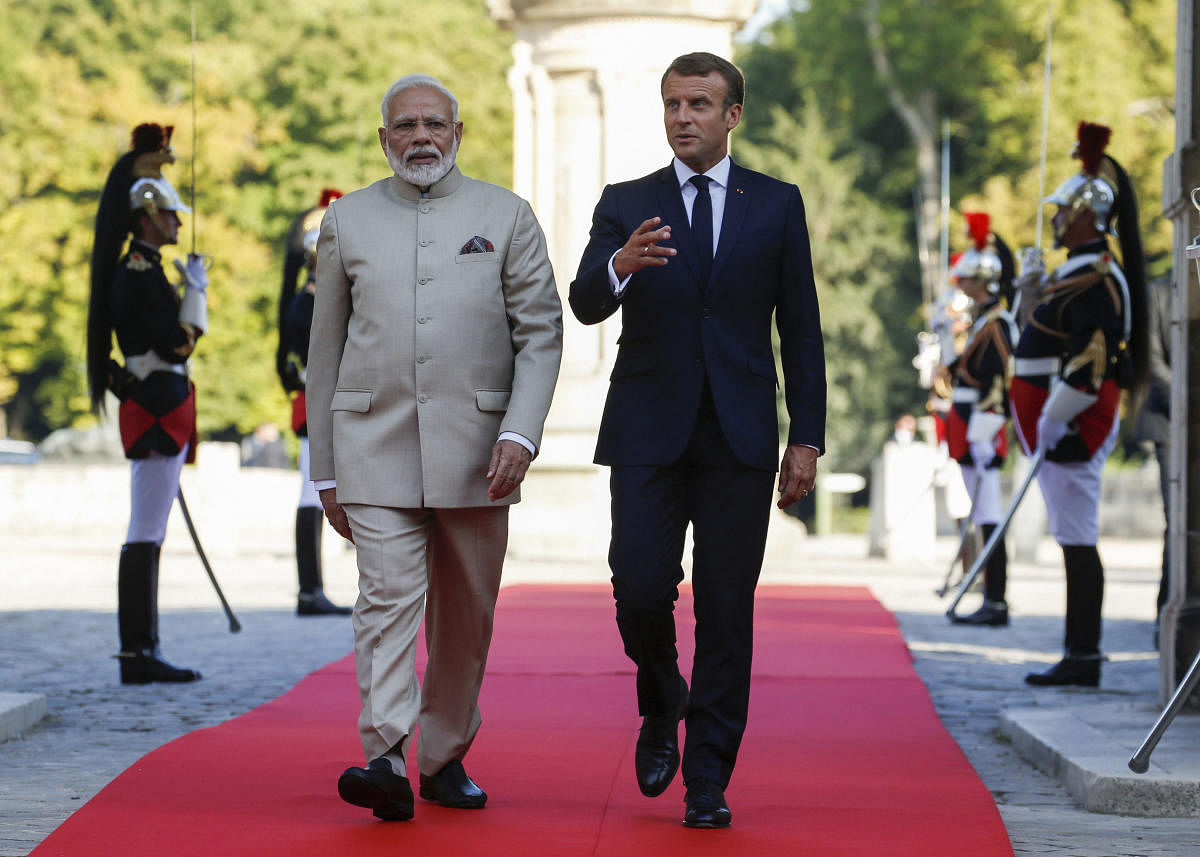 Chantilly: French President Emmanuel Macron, right, welcomes Indian Prime Minister Narendra Modi before a meeting at the Chateau of Chantilly, north of Paris, Thursday, Aug. 22, 2019. Indian Prime Minister Narendra Modi will be a guest at the G7 in Biarri