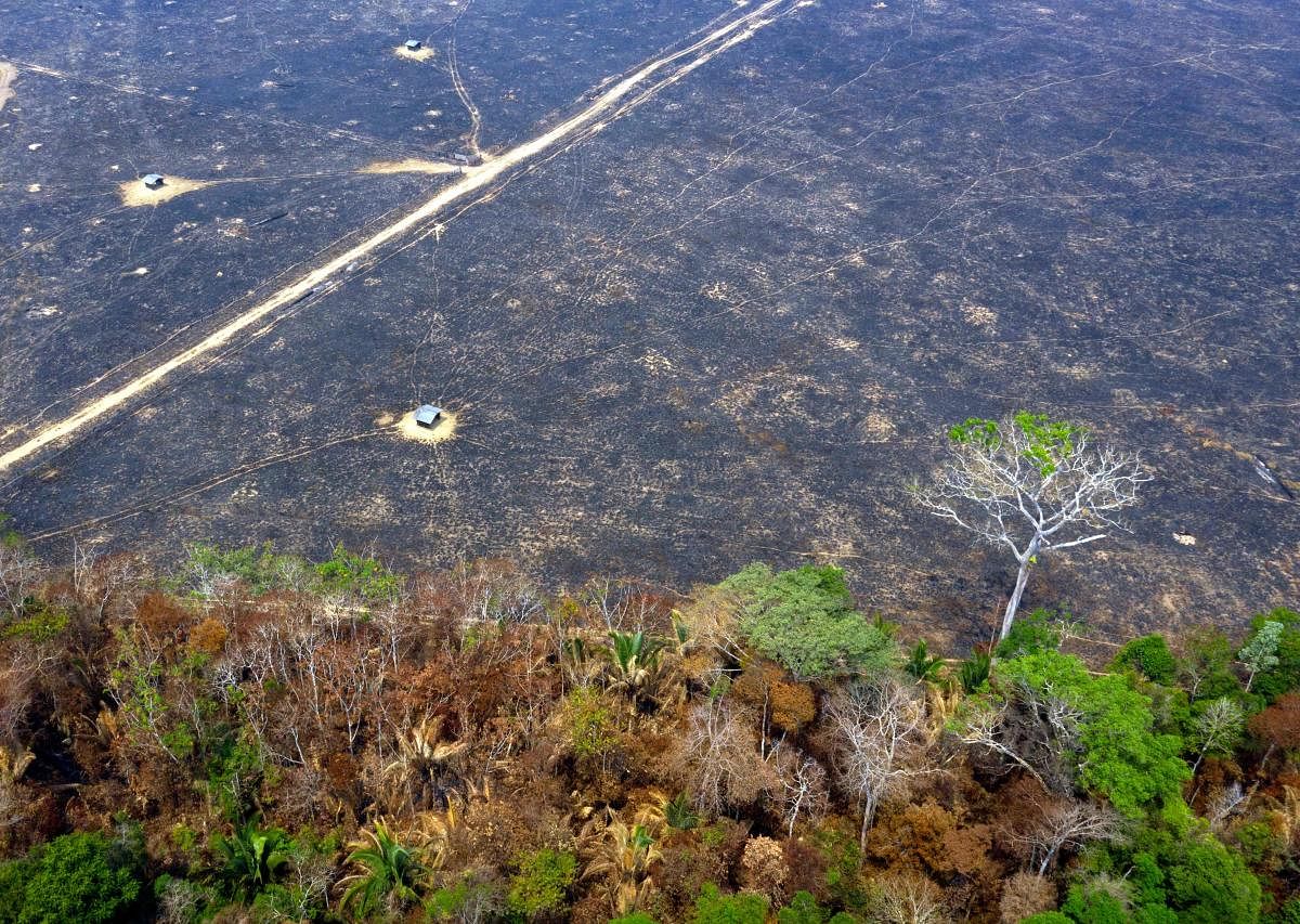  Aerial view of burnt areas of the Amazon rainforest, near Porto Velho, Rondonia state, Brazil, on August 24, 2019. The Amazon fires have become a global issue, escalating tensions between Brazil and European countries who believe Bolsonaro has neglected commitments to protect biodiversity.  AFP file photo