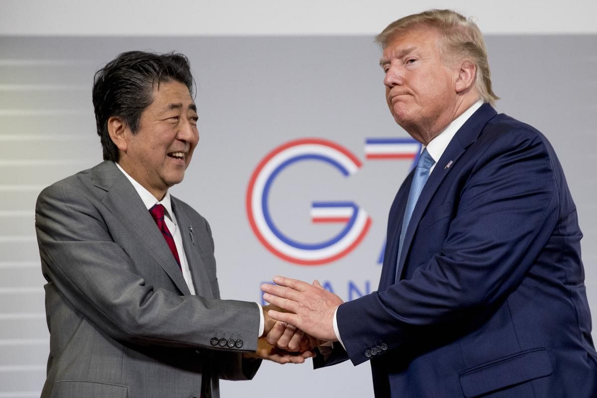 U.S President Donald Trump and Japanese Prime Minister Shinzo Abe (L), announced that the U.S. and Japan have agreed in principle on a new trade agreement, at the G-7 summit in Biarritz, France, Sunday, Aug. 25, 2019 (Photo by AP/PTI)