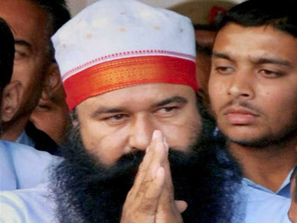 The head of beleaguered Dera Sacha Sauda sect, Gurmeet Ram Rahim Singh has managed to muster up a reserve of Rs 18,000 as wage money into his bank account ever since he has been locked up post his conviction in August 2017. (PTI File Photo)