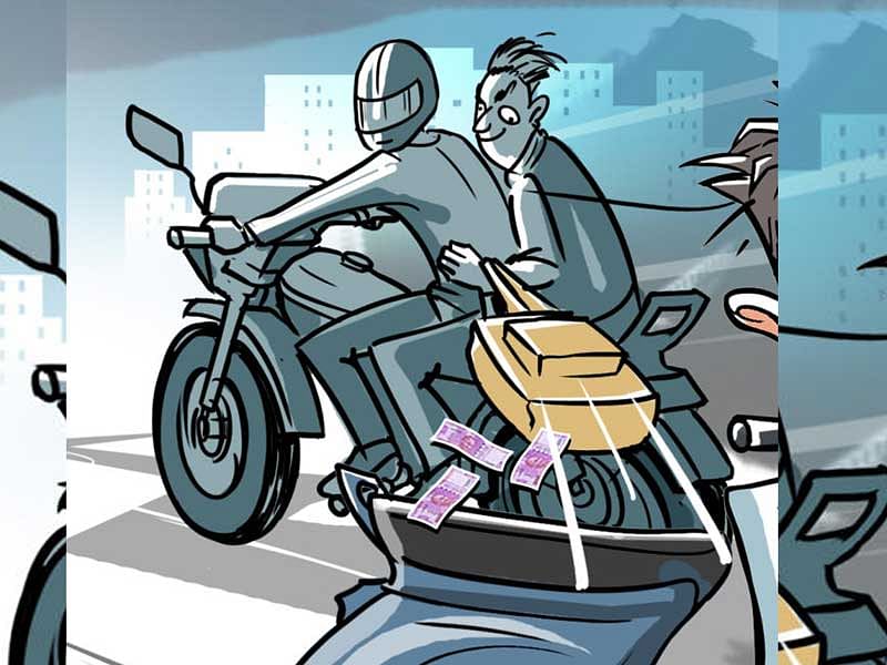 Before Reddy could realise what was happening, the man quickly took the bag of money and rode away on a Hero Splendor, the police said. (DH Illustration. For representation purpose)