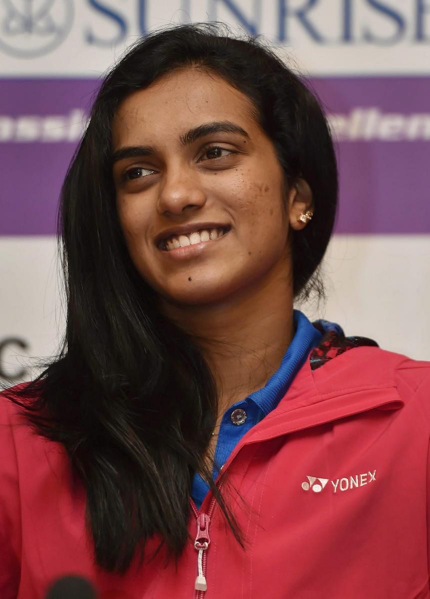 Olympic silver medallist Sindhu called on the sports minister following her arrival here. (PTI Photo)
