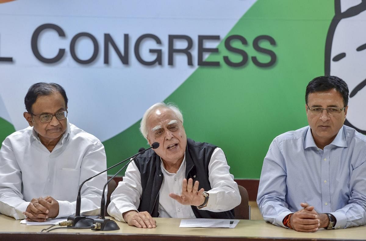Appearing for Chidambaram, senior advocate Kapil Sibal said the agency cannot place documents in the court randomly and "behind the back" for seeking custody of the accused. (PTI Photo/Ravi Choudhary)