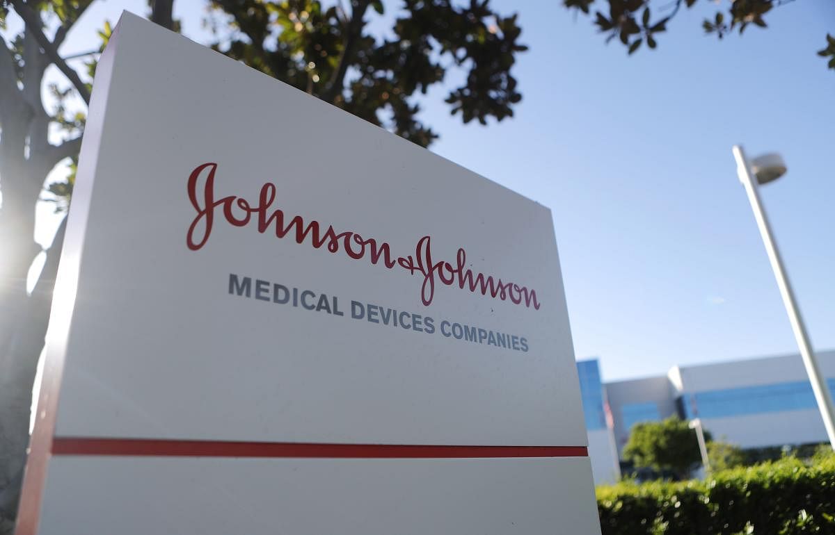 A sign posted at the Johnson & Johnson campus on August 26, 2019 in Irvine, California. A judge has ordered the company to pay $572 million in connection with the opioid crisis in Oklahoma. Mario Tama/Getty Images/AFP 