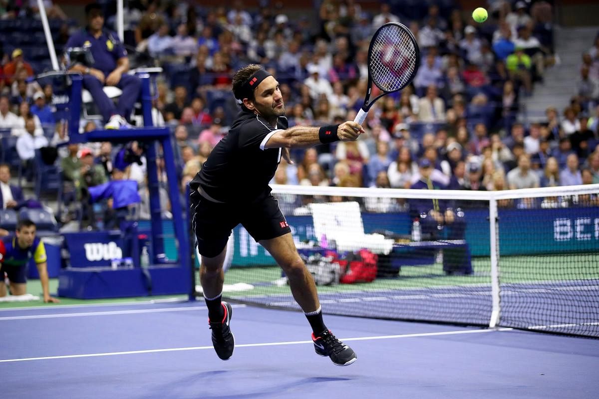 Roger Federer of Switzerland returns a shot against Sumit Nagal of India during their Men's Singles first round match on day one of the 2019 US Open at the USTA Billie Jean King National Tennis Center  in the Flushing neighborhood of the Queens borough of New York City. Photo/AFP 