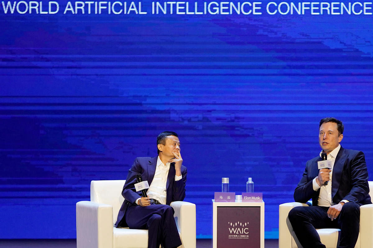 Tesla Inc CEO Musk and Alibaba Group Holding Ltd Executive Chairman Ma attend the World Artificial Intelligence Conference in Shanghai. Reuters photo