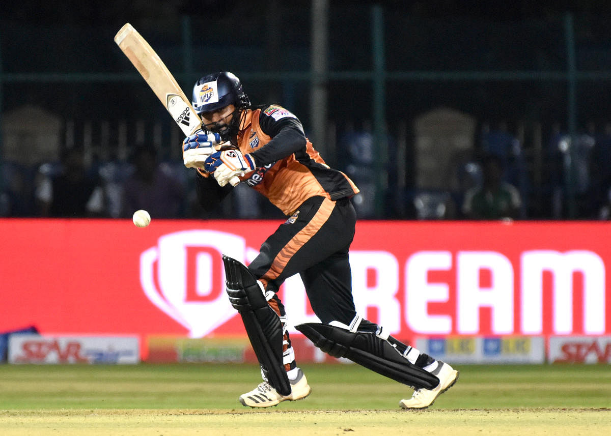 Hubli Tigers' KB Pawan directs one to the fence en route his unbeaten 56 against Shivamogga Lions in the KPL Eliminator in Mysuru on Thursday. DH PHOTO/ Savitha BR